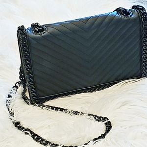Aldo black purse with black chain detail.